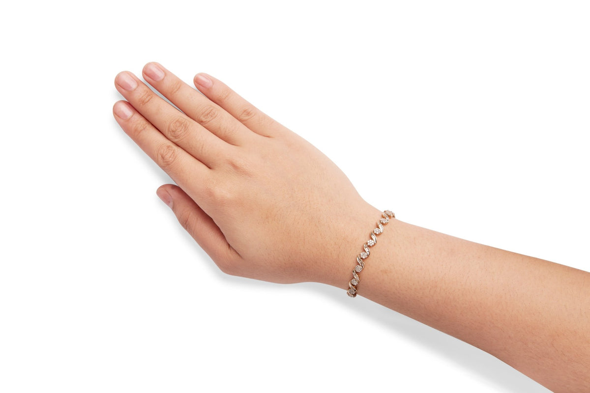 10K Yellow Gold 2.00 Cttw Round-Cut and Baguette-Cut Diamond Floral Design Swirl Link 7&quot; Bracelet (I-J Color, I1-I2 Clarity) - LinkagejewelrydesignLinkagejewelrydesign